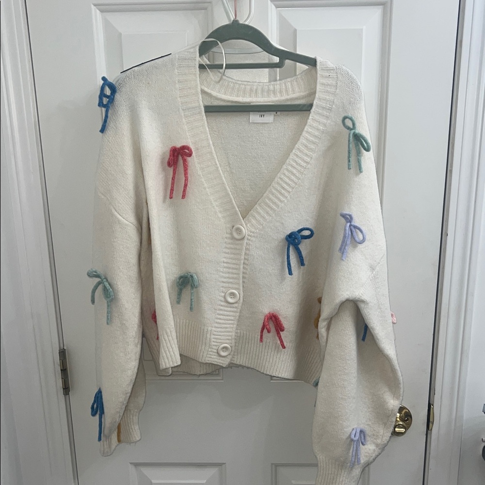 Elegant Cream Cardigan with Colorful Bows